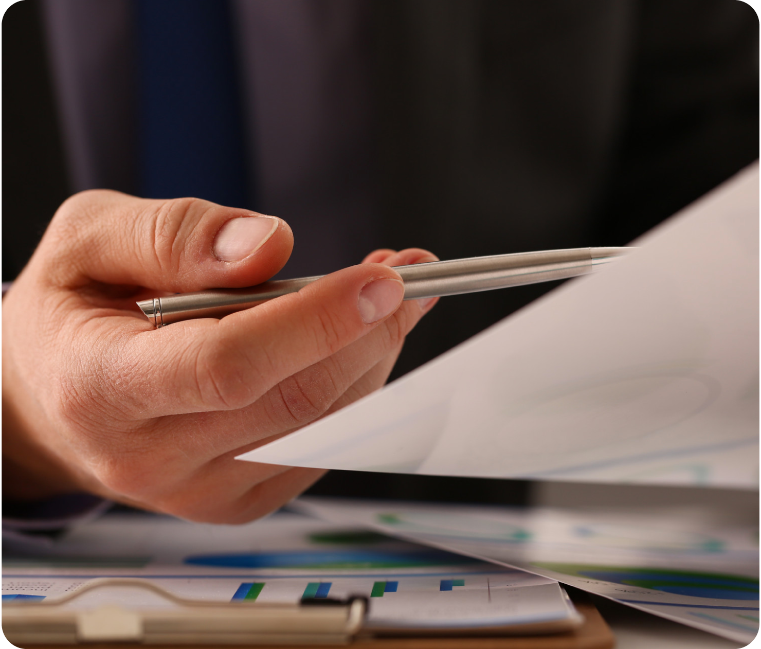 Foto de mano con bolígrafo